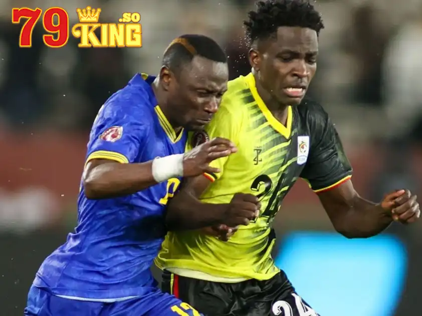 Uganda (áo vàng đen) vừa có trận hòa quan trọng với Tanzania ở lượt trận thứ hai (Ảnh: CAF Online) Uganda (áo vàng đen) vừa có trận hòa quan trọng với Tanzania ở lượt trận thứ hai (Ảnh: CAF Online)